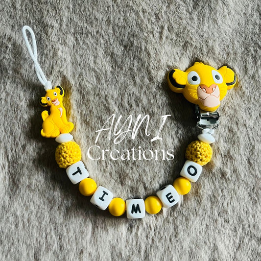 Attache-tétine personnalisée en silicone, modèle ROI LION JAUNE