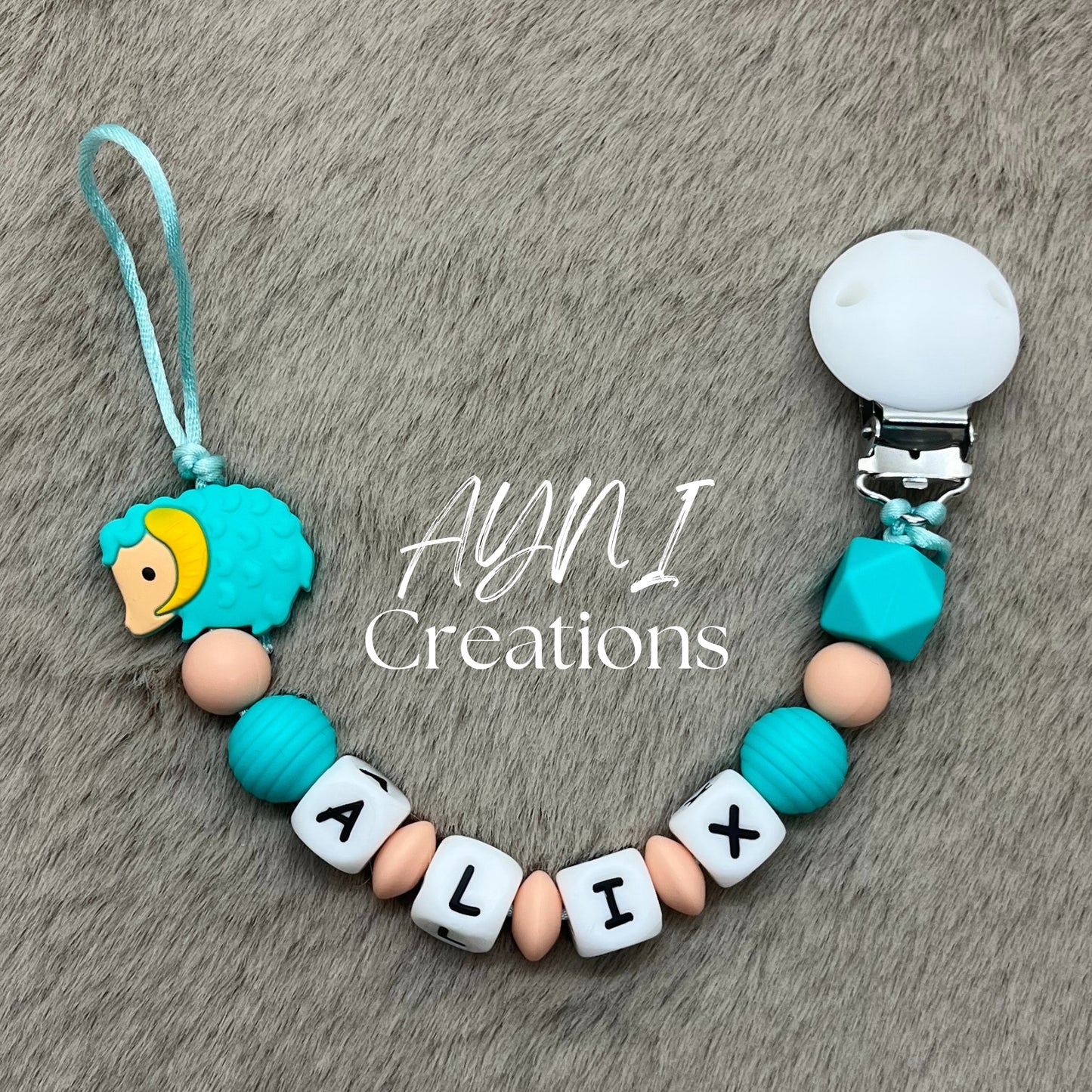 Attache-tétine personnalisée en silicone, modèle MOUTON TURQUOISE